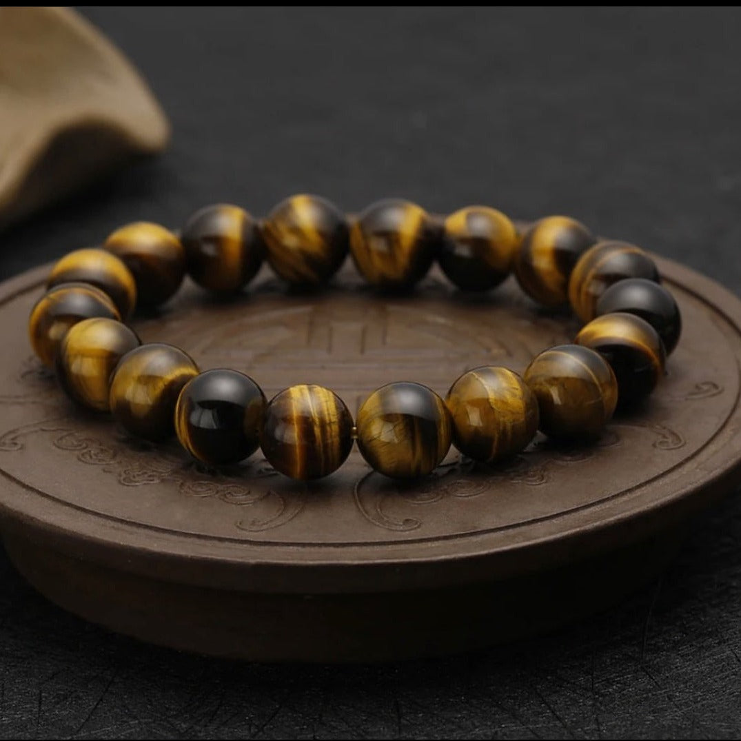 PULSERA ABUNDANCIA DORADA (Ojo de tigre 8 mm)