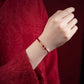 PULSERA HILO ROJO PROSPERIDAD INFINITA ♾️  (EN ORO 18K)